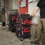 Milwaukee PACKOUT lang værktøjsholder. Miljøbilledet viser produkt med PACKOUT system.
