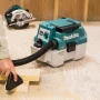 Makita 18V støvsuger. Produkt vises i miljø med model