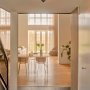 Nordlux Boston 3-rondel loftlampe sort. Miljøbilledet viser produktet i et bryggers.