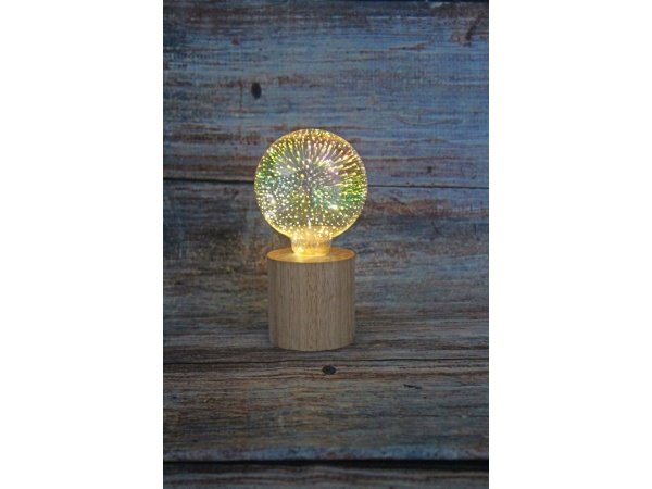 Haarhr & Co LED bordlampe Haarhr & Co LED bordlampe m/træfod, pære m/fyrværkerieffekt. Billedet viser hele produktet med hvid baggrund.