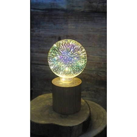 Haarhr & Co LED bordlampe Haarhr & Co LED bordlampe m/træfod, pære m/fyrværkerieffekt. Billedet viser hele produktet med hvid baggrund.