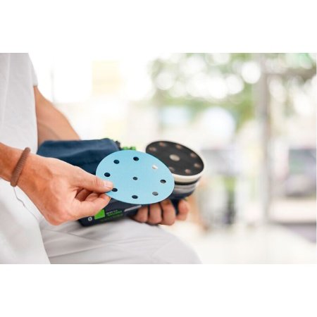 Festool excentersliber  Festool excentersliber ETSC 2 125 Basic. Billedet viser produkt og tilbehør med hvid baggrund.