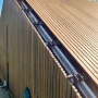 MOSO® N-Durance Savanne facadelister. Produktet ses i brug.