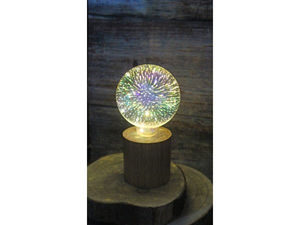 Haarhr & Co LED bordlampe Haarhr & Co LED bordlampe m/træfod, pære m/fyrværkerieffekt. Billedet viser hele produktet med hvid baggrund.