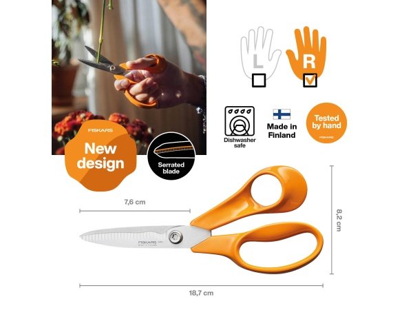 Fiskars have/køkkensaks Fiskars have/køkkensaks 18 cm i orange. Billedet viser produktet lukket.