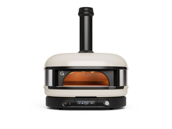 Gozney Dome pizzaovn Gen 2.0, Dual Fuel, bone. Billedet viser produktet forfra og tændt.